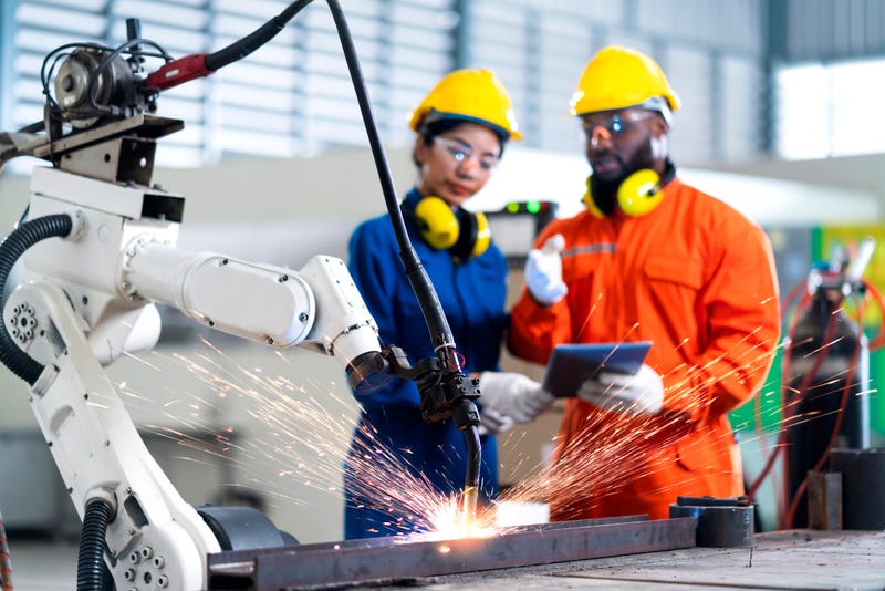 Manufacturing employees stock photo.