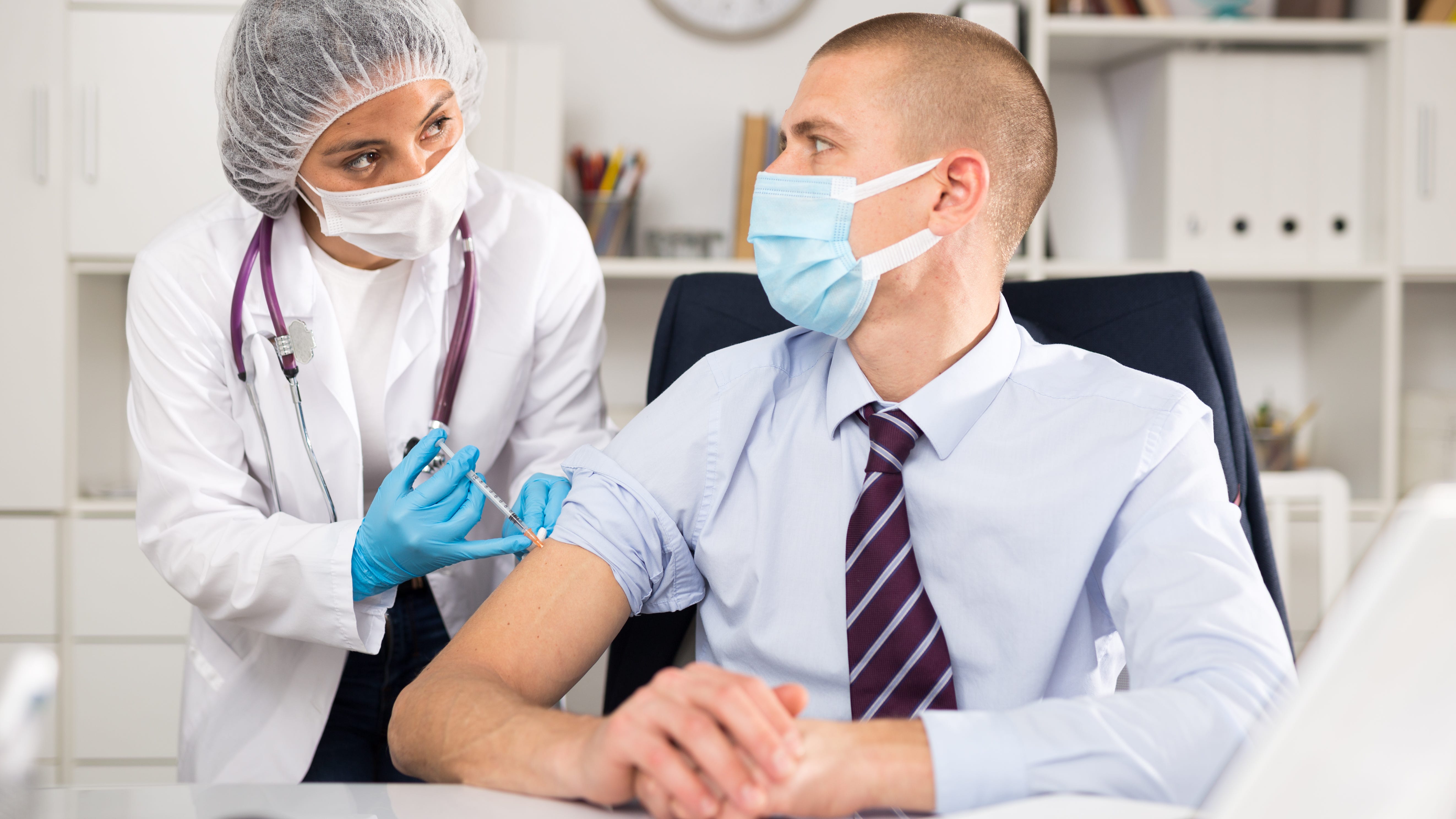 Employers weigh bringing workforce back, mandating COVID-19 vaccines