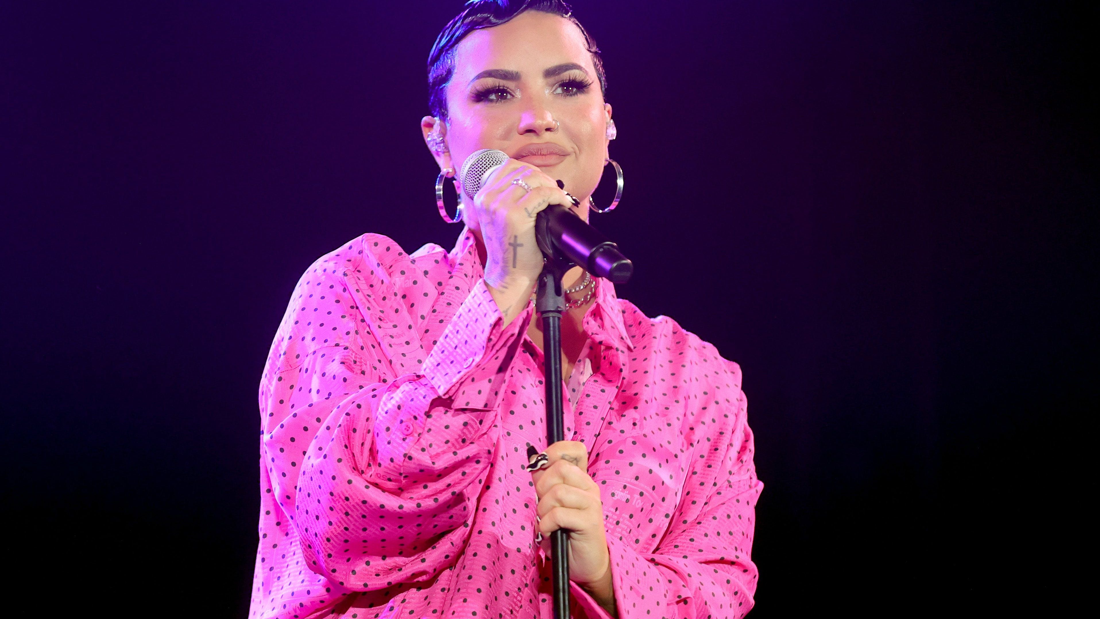Demi Lovato shares truths about dating, kids, and aliens