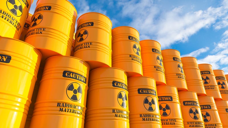Stock photo of yellow hazardous waste barrels