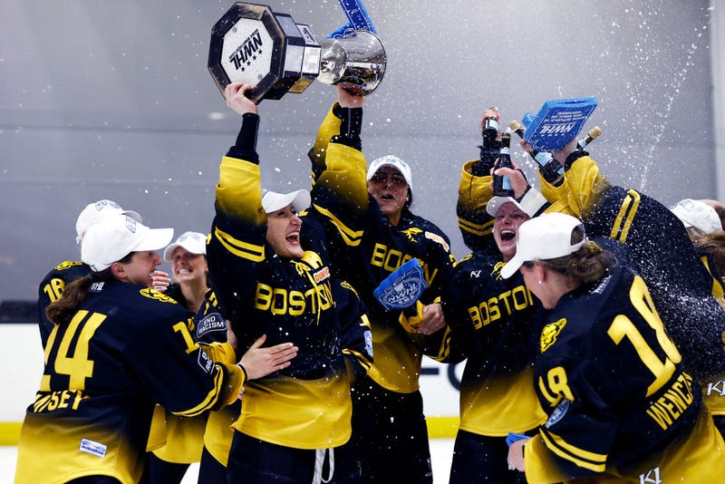 The Boston Pride celebrate their 2021 Isobel Cup championship