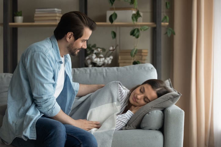 Woman Sleeping On Couch