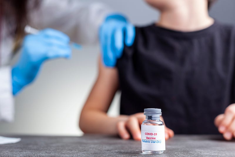 children getting COVID-19 vaccination