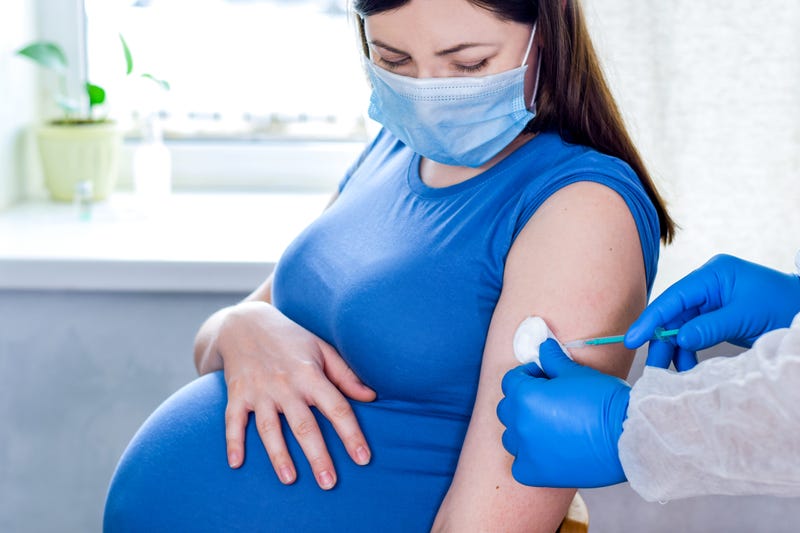 Pregnant woman gets COVID-19 vaccines
