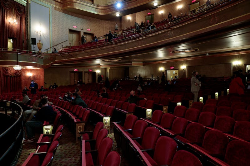 Attendees take their seats for a special NY PopsUp performance for frontline workers at the St. James Theatre on April 03, 2021 in New York City