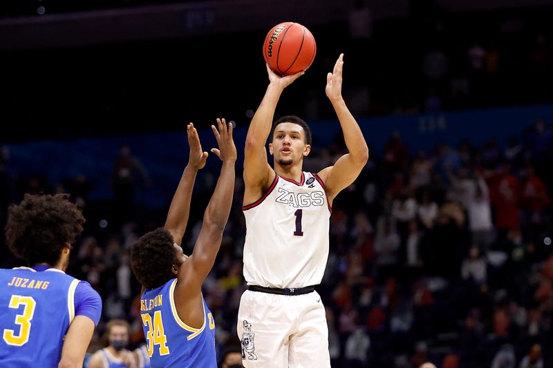 Gonzaga guard Jalen Suggs makes a buzzer-beating shot against UCLA in the 2021 Final Four.