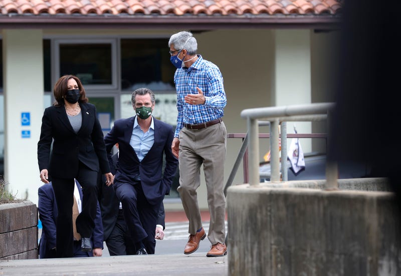 Vice President Kamala Harris (L) and California Gov. Gavin Newsom (C) tour the Upper San Leandro Water Treatment Plant with David Briggs, (R) EBMUD director of operations and maintenance on April 5, 2021 in Oakland, California.