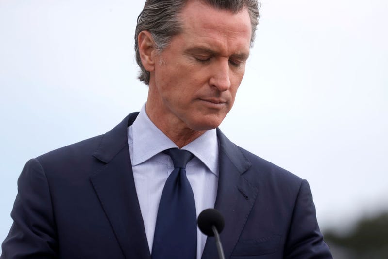 California Gov. Gavin Newsom pauses as he speaks during a news conference after touring the vaccination clinic at City College of San Francisco on April 06, 2021 in San Francisco, California.