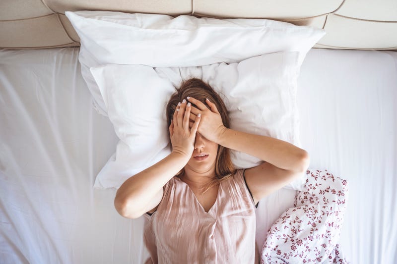 woman having trouble sleeping
