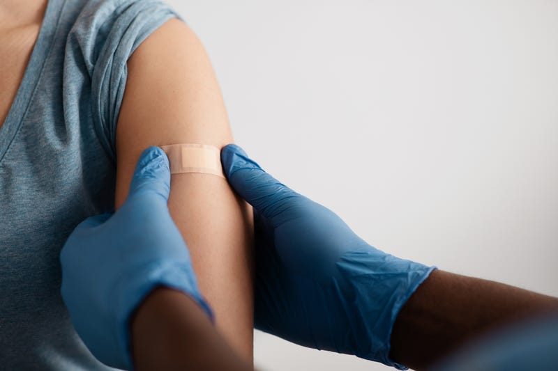 Bandage after vaccine stock photo.