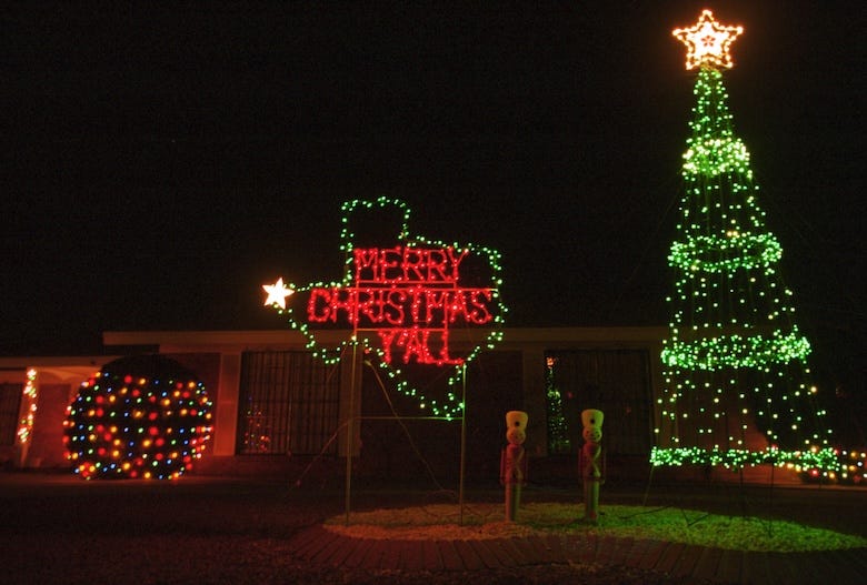 Texas-themed Christmas lights in front of a home
