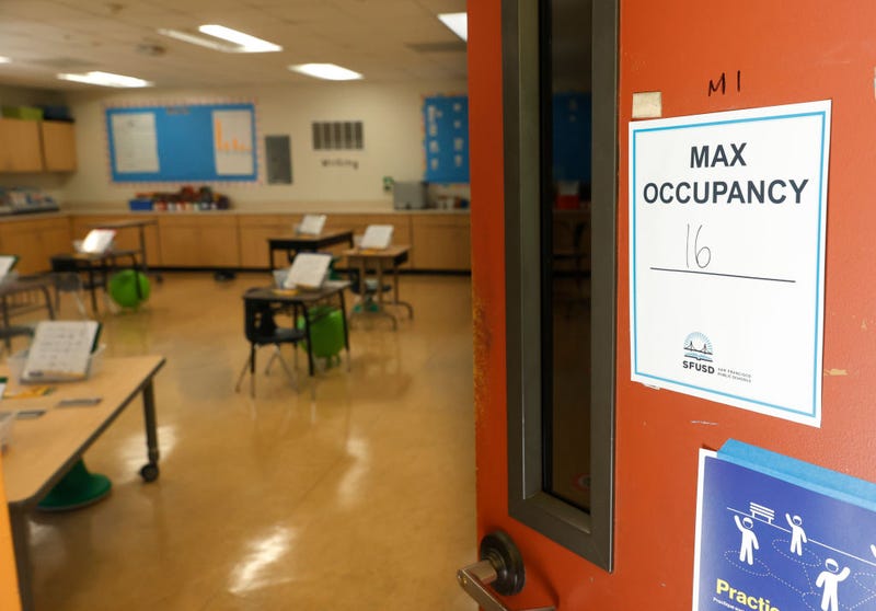 A maximum occupancy sign is posted on the door of a first grade class at Bryant Elementary School on April 09, 2021 in San Francisco, California.