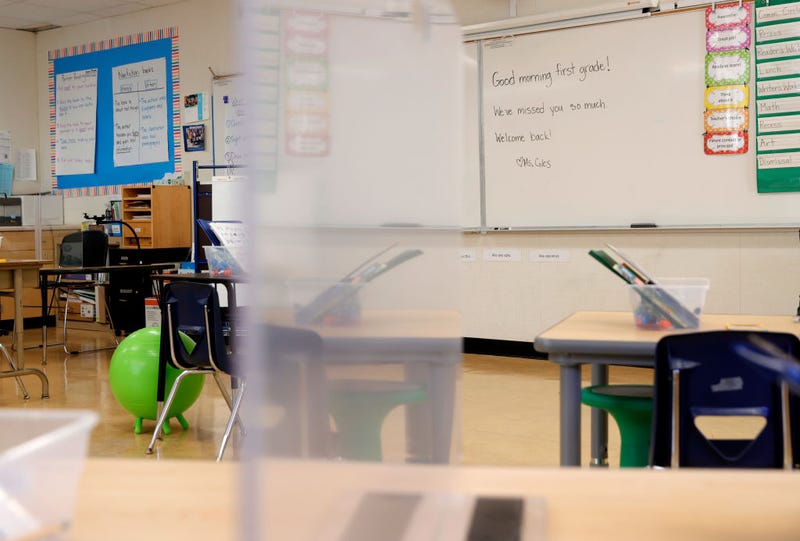 A message welcoming students back to class is posted on a whiteboard in a first grade class at Bryant Elementary School on April 09, 2021 in San Francisco, California.