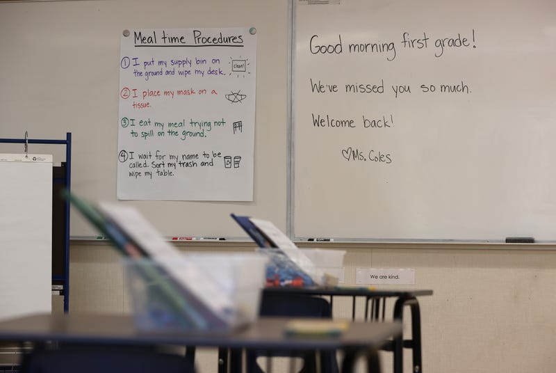 A message welcoming students back to class is posted on a whiteboard in a first grade class at Bryant Elementary School on April 09, 2021 in San Francisco, California. 