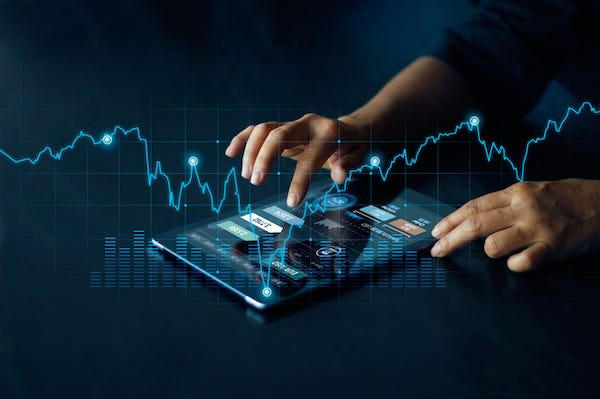 Businessman using tablet online banking, exchange currency and payments
