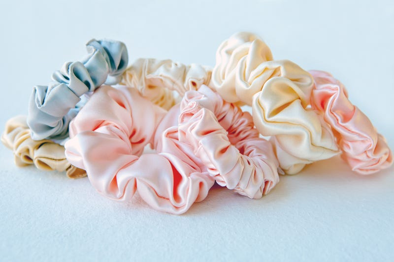 Lot of Colorful silk Scrunchies isolated on white. Flat lay Hairdressing tools and accessories. Hair Scrunchies, Elastic HairBands, Bobble Sports Scrunchie Hairband