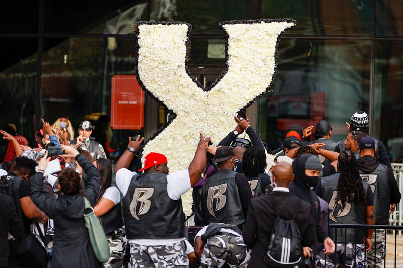 A group of mourners pay tribute during the Memorial Service Held For Rapper DMX at Barclays Center on April 24, 2021 in New York City. 