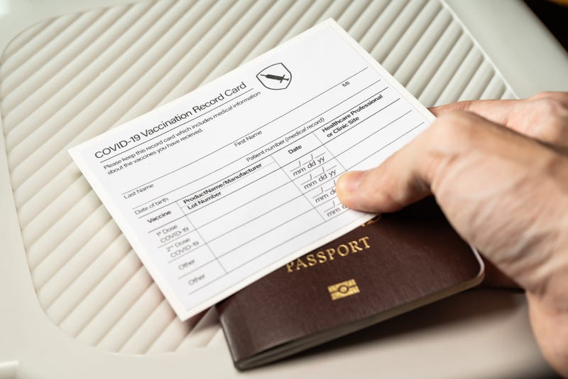 Passport and vaccine card stock photo.