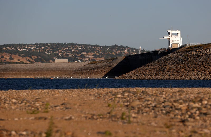 Low water levels are visible along Folsom Dam at Folsom Lake on May 10, 2021 in Granite Bay, California.