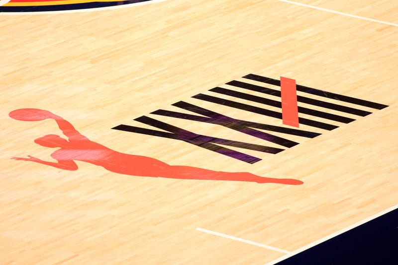 A logo of the 25th anniversary of the WNBA is displayed on the court between the Indiana Fever and the New York Liberty at Bankers Life Fieldhouse on May 16, 2021 in Indianapolis, Indiana.