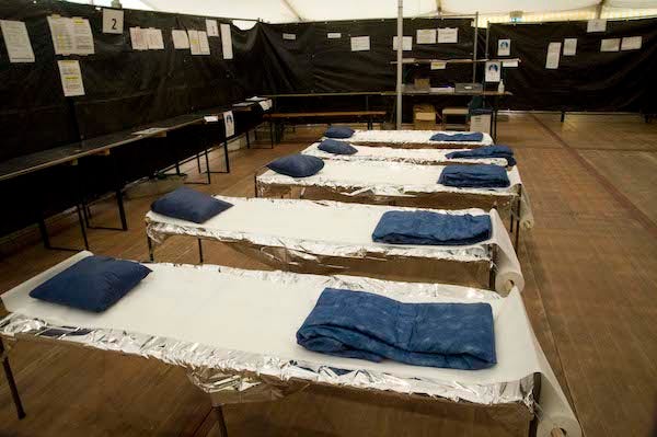 Cots in emergency shelter
