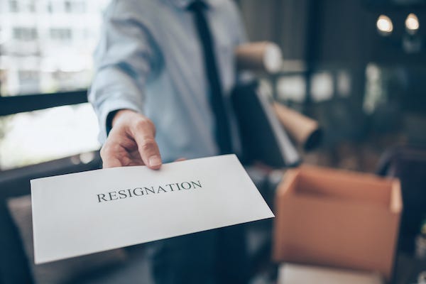 Businessman showing a letter of resignation