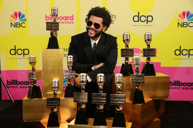 The Weeknd, winner of the Top Artist Award, Top Male Artist Award, Top Hot 100 Artist Award, Top Radio Songs Artist Award, Top R&B Artist Award, Top R&B Album Award, Top Billboard 200 Album Award, Top Hot 100 Song Presented by Rockstar Award, Top Radio Song Award, and Top R&B Song Award poses backstage for the 2021 Billboard Music Awards, broadcast on May 23, 2021 at Microsoft Theater in Los Angeles, California