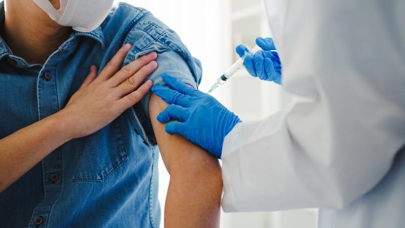 Close up of doctor giving shot