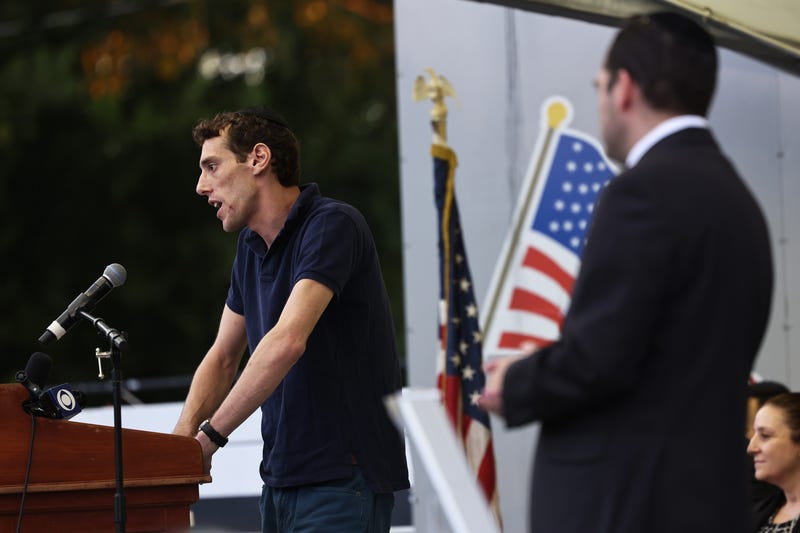 Joseph Borgen, a recent victim of a hate crime, speaks during a rally denouncing anti-Semitic violence on May 27, 2021 in Cedarhurst, New York. A rally was held by various organizations and local Jewish community groups to support Borgen after a rise of violent anti-Semitic attacks in New York and across the U.S. 