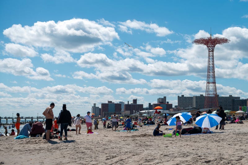 People enjoy the beach at Coney Island on Memorial Day in Brooklyn on May 31, 2021.