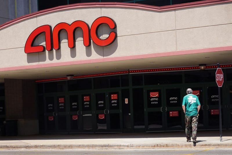 A sign hangs outside of an AMC theater on June 01, 2021 in Skokie, Illinois. Mudrick Capital has agreed to purchase 8.5 million share of the theater chain for $230.5 million. (Photo by Scott Olson/Getty Images)
