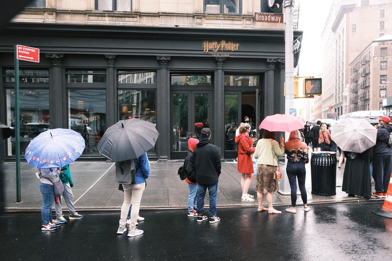 File photo: A large crowd gathers in front of the recently opened Harry Potter retail store in Manhattan on June 03, 2021