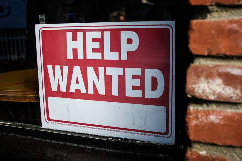 Help wanted sign.