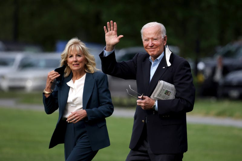 President Joe Biden waves as he and First Lady Jill Biden board Marine One headed to the G-7 summit in the UK.