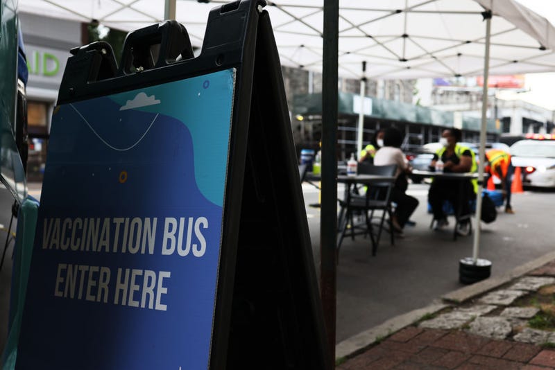 A mobile vaccination site is seen on Flatbush Avenue on June 09, 2021 in the Flatbush neighborhood of the Brooklyn borough of New York City. The rate of coronavirus (COVID-19) vaccinations has dropped since peaking in April, putting in jeopardy the goal of having 70 percent of adults receive at least one dose of a coronavirus vaccine by July 4 set by U.S. President Joe Biden. Centers for Disease Control and Prevention (CDC) data shows 63.7 percent of Americans over the age of 18 have received a first dose of a vaccine and 53 percent have been fully vaccinated. (Photo by Michael M. Santiago/Getty Images)