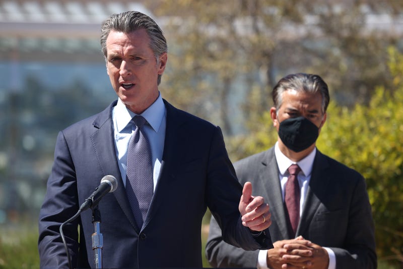 California Gov. Gavin Newsom (L) speaks as California Attorney General Rob Bonta (R) looks on during a news conference at San Francisco General Hospital on June 10, 2021 in San Francisco, California.