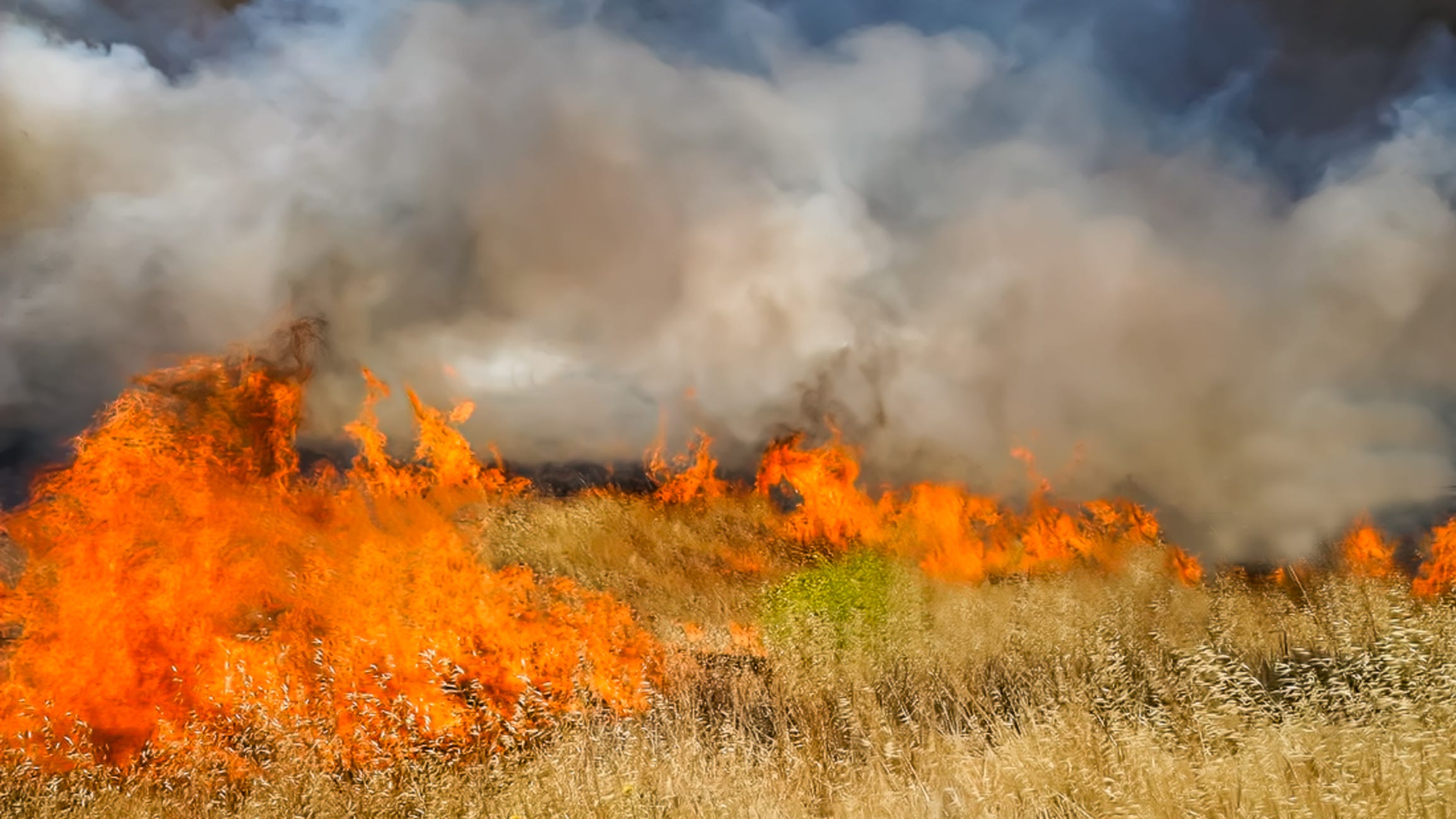 Crews make progress on some Texas wildfires, but others continue to break out