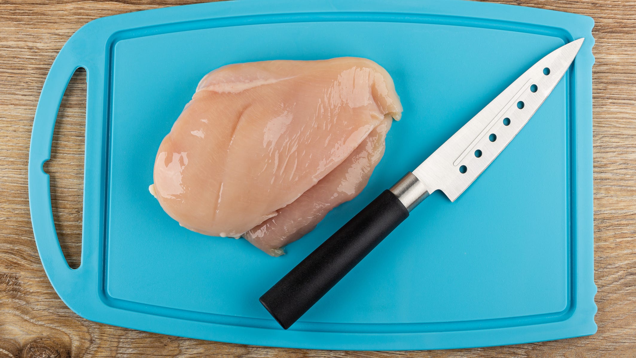 Should you wash raw chicken before cooking it?