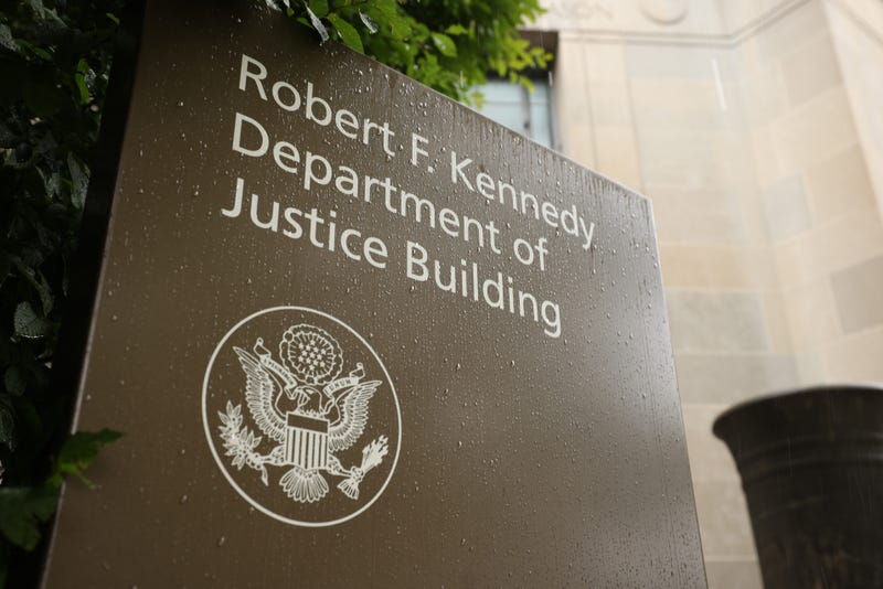 U.S. Department of Justice sign.