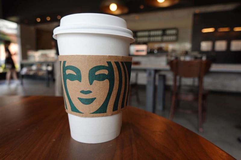 A Starbucks coffee cup sits on a table as the company reported supply shortages at some coffee shops on June 11, 2021 in Miami, Florida.
