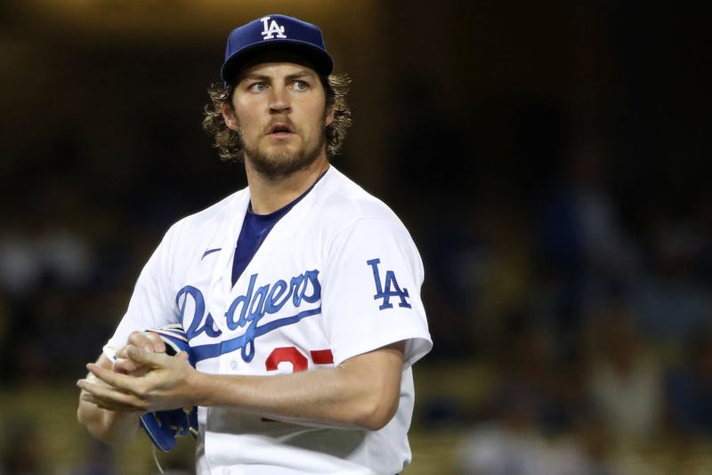 FILE - Trevor Bauer #27 of the Los Angeles Dodgers looks on after giving up a hit to Joey Gallo #13 of the Texas Rangers during the fifth inning at Dodger Stadium on June 12, 2021 in Los Angeles.