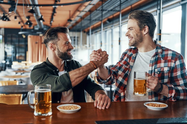 Two friends at bar