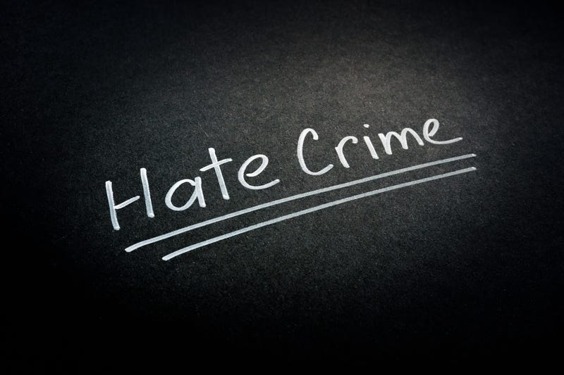 Hate crime written on chalk board