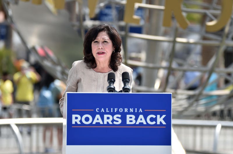 Los Angeles County Supervisor Hilda Solis attends California Gov. Gavin Newsom's press conference for the official reopening of the state of California at Universal Studios Hollywood on June 15, 2021 in Universal City, California. Since the state's reopening, new coronavirus cases in L.A. County have skyrocketed. Solis cited the growing number of cases when she issued an executive order Wednesday night requiring all county employees get vaccinated.