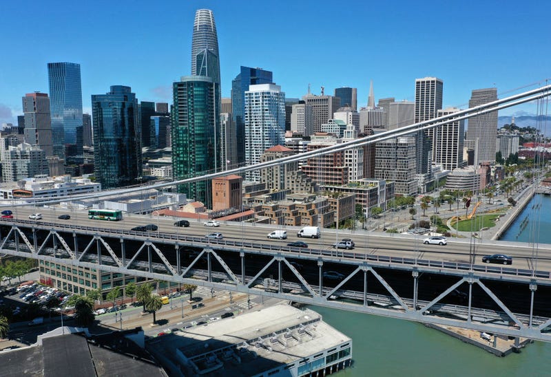 In an aerial view, traffic crosses the San Francisco-Oakland Bay Bridge on June 14, 2021 in San Francisco, California.