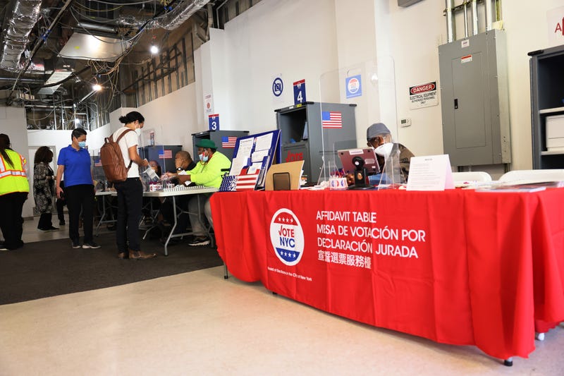 People participate in early voting on June 16, 2021 in the Upper West Side neighborhood of Manhattan in New York City
