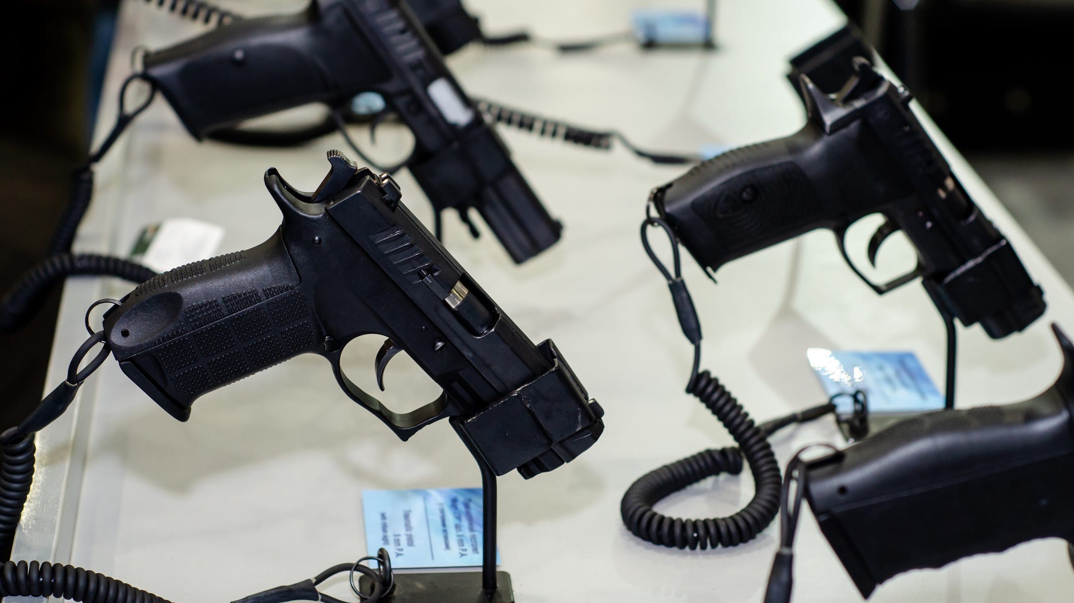 Days after massive manhunt, Virginia opens up gun laws