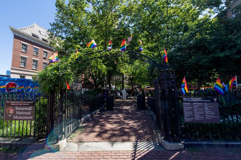 The Stonewall Monument is decorated with pride flags