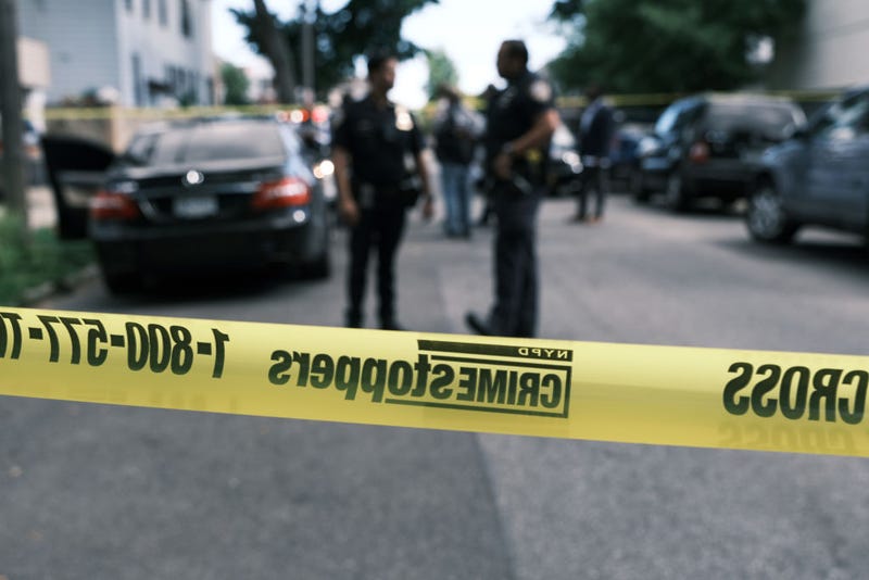 Police investigate the scene of a shooting in Brooklyn on June 23, 2021 in New York City.