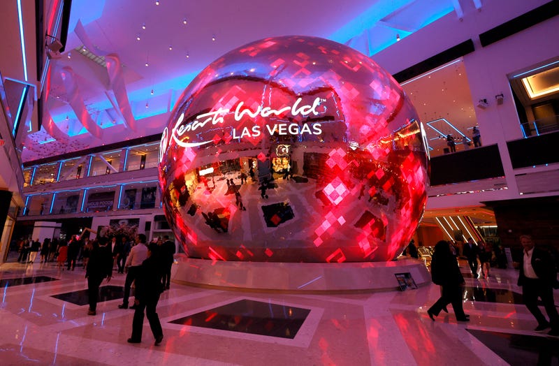 Guests walk by a digital sphere during the opening of Resorts World Las Vegas on June 24, 2021 in Las Vegas, Nevada.